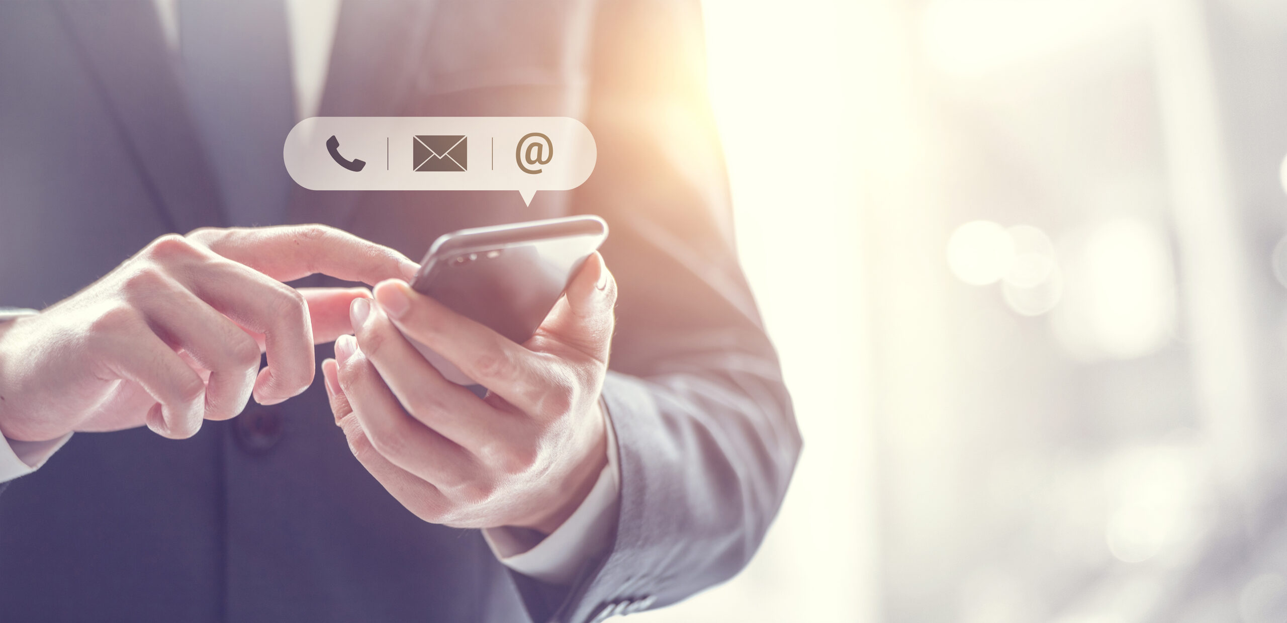 CONTACT US, Hand of Businessman holding mobile smartphone with (